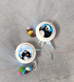 Μπομπονιέρα βάπτισης παιχνίδι γιογιό, με θέμα Kung Fu Panda και το όνομα του μωρού.