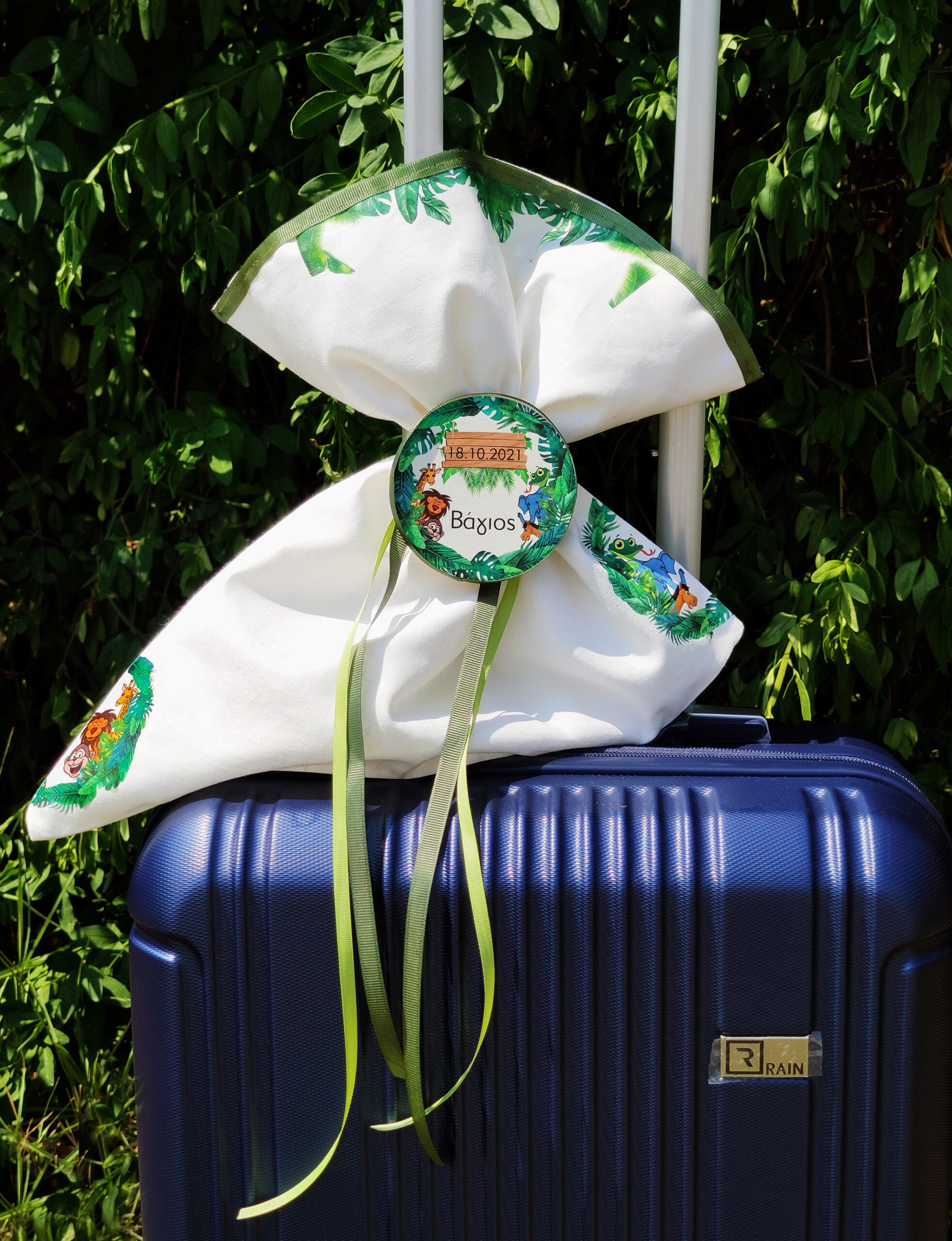 Πακέτο βάπτισης για αγόρι με θέμα ζωάκια της ζούγκλας σε πράσινες αποχρώσεις.