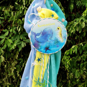 Πακέτο βάπτισης για αγόρι με θέμα βυθός σε γαλάζιες, βεραμάν και κίτρινες αποχρώσεις.