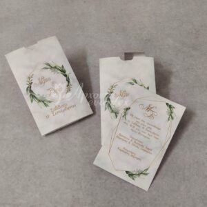 Προσκλητήριο γάμου με γεωμετρικό θέμα με φύλλα.