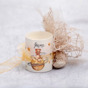 Μπομπονιέρα βάπτισης κερί σε θήκη με θέμα "Dream on"  ή με θέμα της επιλογής σας.