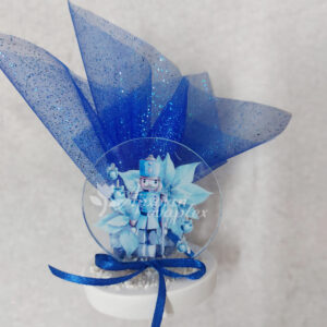 Χριστουγενιάτικη μπομπονιέρα plexiglass με θέμα καρυοθραύστης σε βότσαλο.