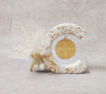 Μπομπονιέρα γάμου  - βάπτισης κεραμική με κρεμαστό κωνσταντινάτο από χρυσό καθρέφτη plexi glass.