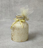 Μπομπονιέρα βάπτισης κεραμικό ανθοδοχείο σε εκρού και χρυσή απόχρωση.