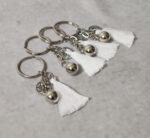 Μαρτυρικά βάπτισης κομπολόι - μπρελόκ Boho με σχοινιά ξύλινες χάντρες και μεταλλικό σταυρό.