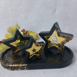 Χριστουγεννιάτικη σύνθεση με κεραμικά αστέρια με χρυσό plexiglass